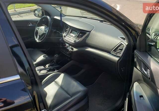 Черный Хендай Туксон, объемом двигателя 1.59 л и пробегом 101 тыс. км за 20600 $, фото 20 на Automoto.ua