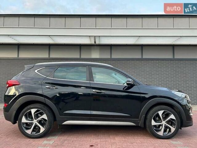 Чорний Хендай Туксон, об'ємом двигуна 1.69 л та пробігом 98 тис. км за 14000 $, фото 5 на Automoto.ua