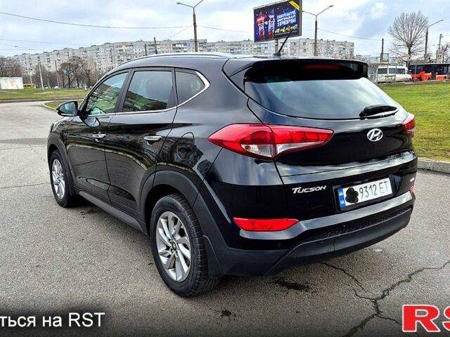 Черный Хендай Туксон, объемом двигателя 2 л и пробегом 123 тыс. км за 15900 $, фото 3 на Automoto.ua