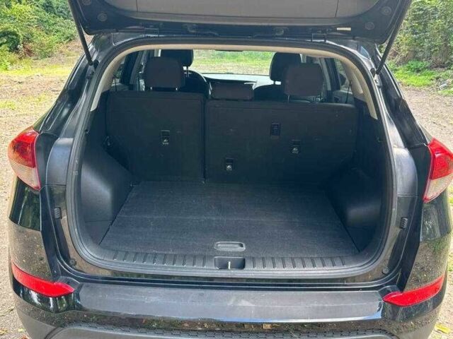 Черный Хендай Туксон, объемом двигателя 2 л и пробегом 83 тыс. км за 4400 $, фото 13 на Automoto.ua