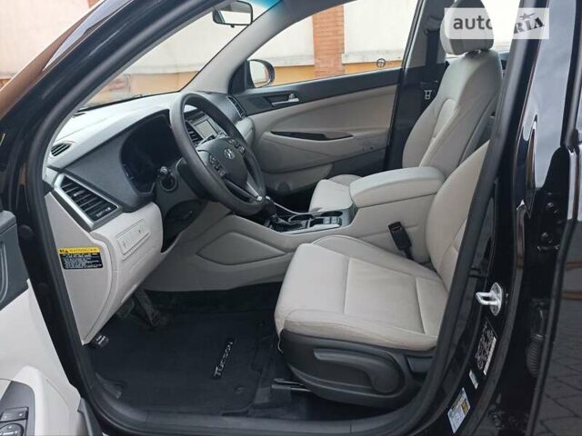 Черный Хендай Туксон, объемом двигателя 2 л и пробегом 107 тыс. км за 14800 $, фото 16 на Automoto.ua