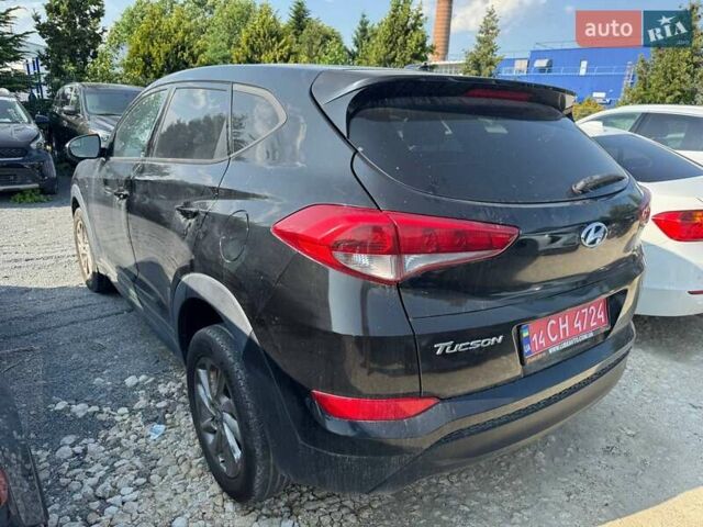 Чорний Хендай Туксон, об'ємом двигуна 2 л та пробігом 119 тис. км за 11700 $, фото 4 на Automoto.ua