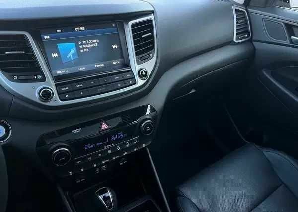 Чорний Хендай Туксон, об'ємом двигуна 2 л та пробігом 131 тис. км за 10400 $, фото 9 на Automoto.ua