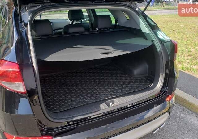 Черный Хендай Туксон, объемом двигателя 1.59 л и пробегом 101 тыс. км за 20600 $, фото 10 на Automoto.ua