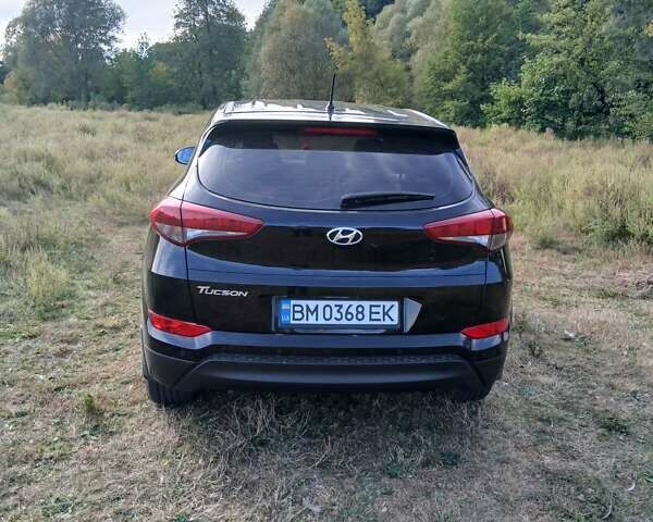 Черный Хендай Туксон, объемом двигателя 2 л и пробегом 148 тыс. км за 17800 $, фото 2 на Automoto.ua
