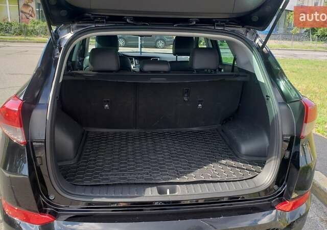 Черный Хендай Туксон, объемом двигателя 1.59 л и пробегом 101 тыс. км за 20600 $, фото 15 на Automoto.ua