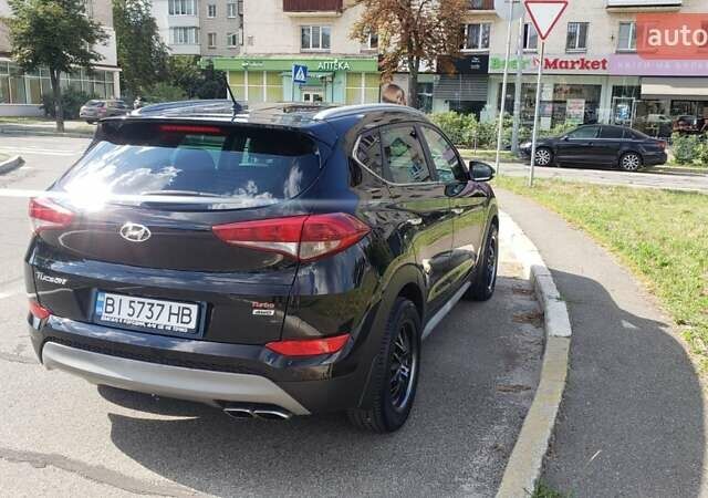 Черный Хендай Туксон, объемом двигателя 1.59 л и пробегом 101 тыс. км за 20600 $, фото 11 на Automoto.ua