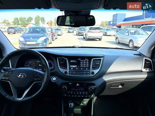 Черный Хендай Туксон, объемом двигателя 2 л и пробегом 98 тыс. км за 24000 $, фото 16 на Automoto.ua