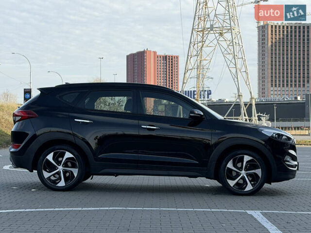 Черный Хендай Туксон, объемом двигателя 1.59 л и пробегом 182 тыс. км за 16800 $, фото 17 на Automoto.ua