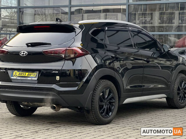 Черный Хендай Туксон, объемом двигателя 2 л и пробегом 106 тыс. км за 17900 $, фото 5 на Automoto.ua