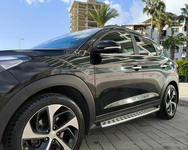 Черный Хендай Туксон, объемом двигателя 2 л и пробегом 120 тыс. км за 21000 $, фото 15 на Automoto.ua