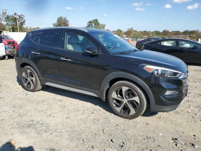 Черный Хендай Туксон, объемом двигателя 1.6 л и пробегом 157 тыс. км за 2600 $, фото 3 на Automoto.ua