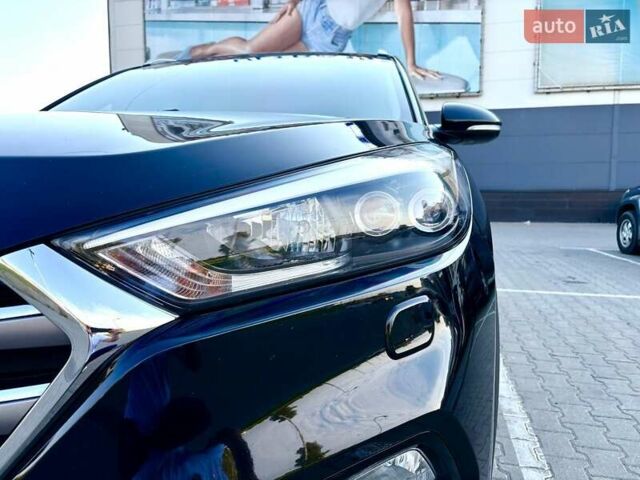 Черный Хендай Туксон, объемом двигателя 2 л и пробегом 98 тыс. км за 24000 $, фото 4 на Automoto.ua