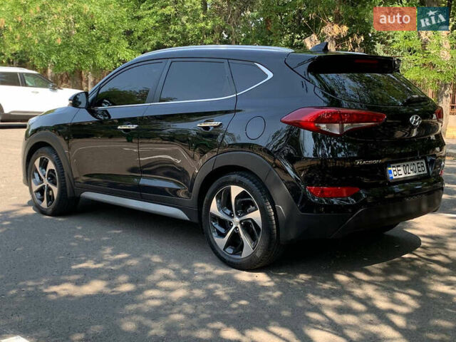 Черный Хендай Туксон, объемом двигателя 2 л и пробегом 122 тыс. км за 19800 $, фото 6 на Automoto.ua