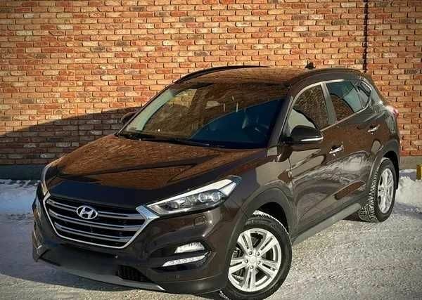 Чорний Хендай Туксон, об'ємом двигуна 2 л та пробігом 131 тис. км за 10400 $, фото 1 на Automoto.ua