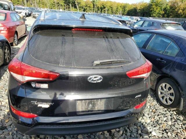 Чорний Хендай Туксон, об'ємом двигуна 2 л та пробігом 45 тис. км за 10000 $, фото 4 на Automoto.ua