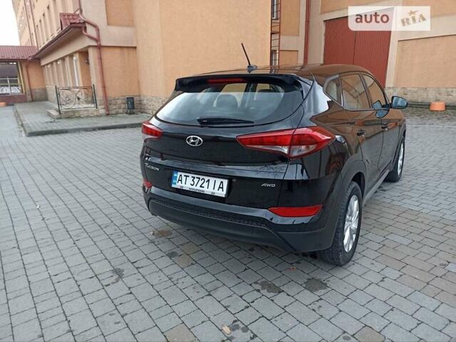 Черный Хендай Туксон, объемом двигателя 2 л и пробегом 107 тыс. км за 14800 $, фото 5 на Automoto.ua