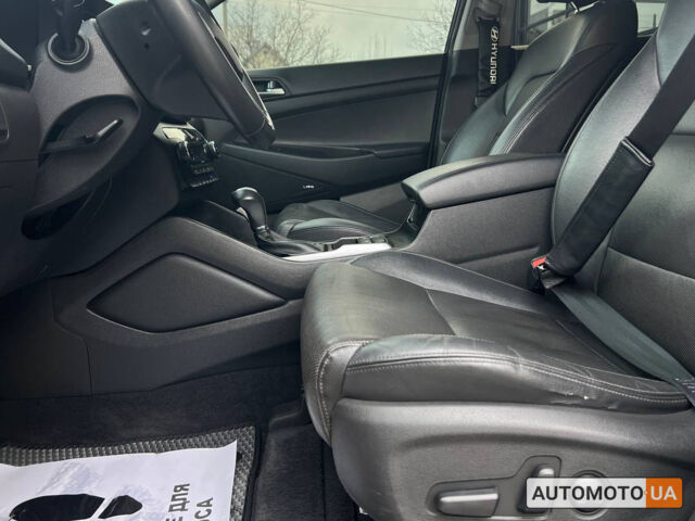 Черный Хендай Туксон, объемом двигателя 2 л и пробегом 106 тыс. км за 17900 $, фото 9 на Automoto.ua