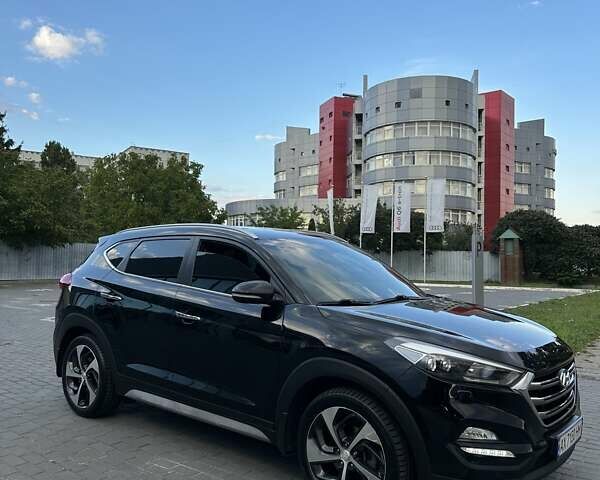 Черный Хендай Туксон, объемом двигателя 2 л и пробегом 147 тыс. км за 20500 $, фото 4 на Automoto.ua
