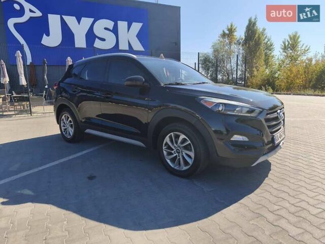 Черный Хендай Туксон, объемом двигателя 2 л и пробегом 168 тыс. км за 16400 $, фото 1 на Automoto.ua