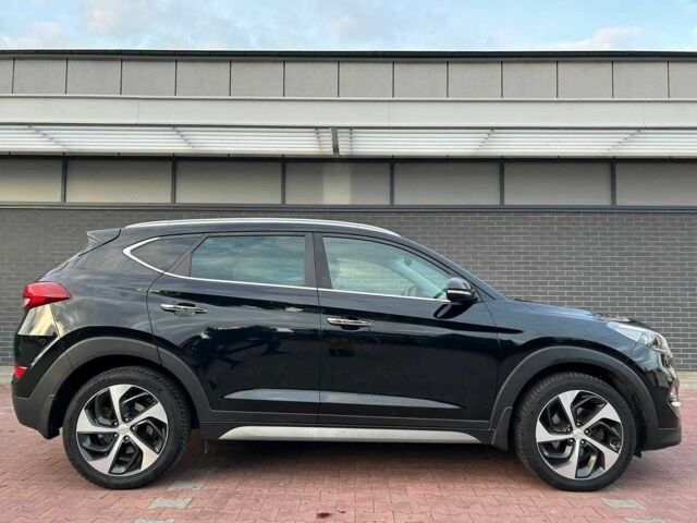 Чорний Хендай Туксон, об'ємом двигуна 1.7 л та пробігом 98 тис. км за 14000 $, фото 5 на Automoto.ua