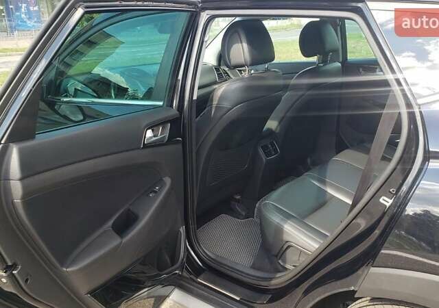 Черный Хендай Туксон, объемом двигателя 1.59 л и пробегом 101 тыс. км за 20600 $, фото 17 на Automoto.ua