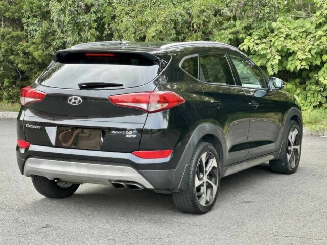 Черный Хендай Туксон, объемом двигателя 1.6 л и пробегом 53 тыс. км за 2950 $, фото 5 на Automoto.ua