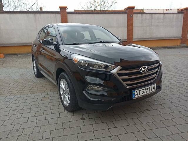 Черный Хендай Туксон, объемом двигателя 2 л и пробегом 107 тыс. км за 14800 $, фото 1 на Automoto.ua