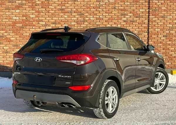 Чорний Хендай Туксон, об'ємом двигуна 2 л та пробігом 131 тис. км за 10400 $, фото 4 на Automoto.ua