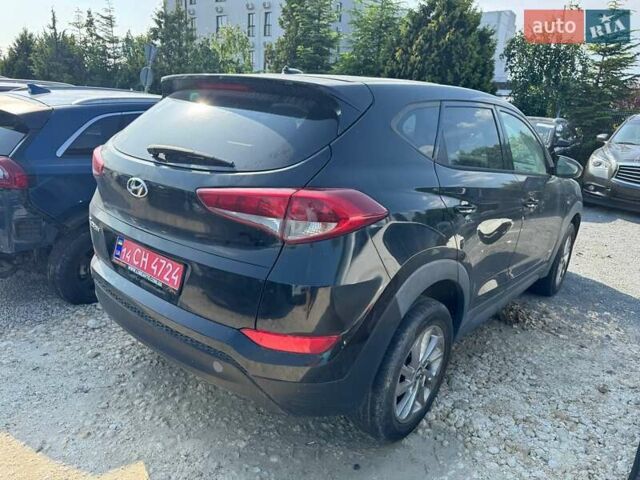 Чорний Хендай Туксон, об'ємом двигуна 2 л та пробігом 119 тис. км за 11700 $, фото 3 на Automoto.ua