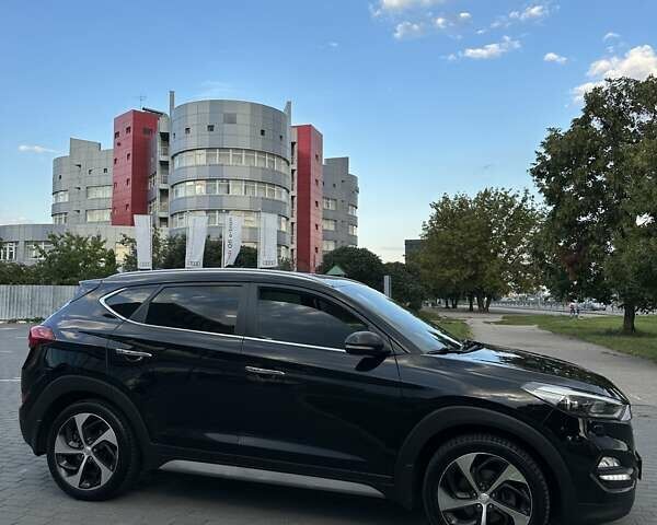 Черный Хендай Туксон, объемом двигателя 2 л и пробегом 147 тыс. км за 20500 $, фото 5 на Automoto.ua