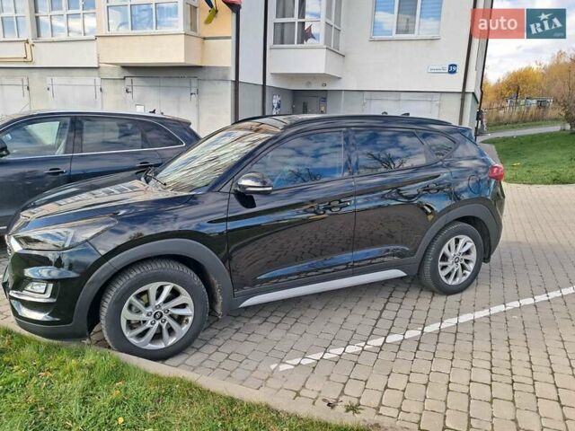 Черный Хендай Туксон, объемом двигателя 2 л и пробегом 126 тыс. км за 16600 $, фото 6 на Automoto.ua
