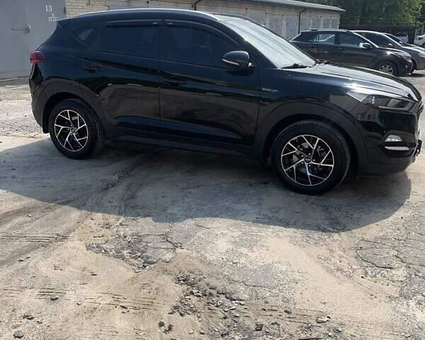Чорний Хендай Туксон, об'ємом двигуна 1.69 л та пробігом 130 тис. км за 23500 $, фото 1 на Automoto.ua