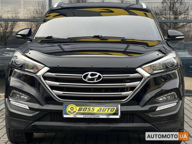 Черный Хендай Туксон, объемом двигателя 2 л и пробегом 106 тыс. км за 17900 $, фото 1 на Automoto.ua