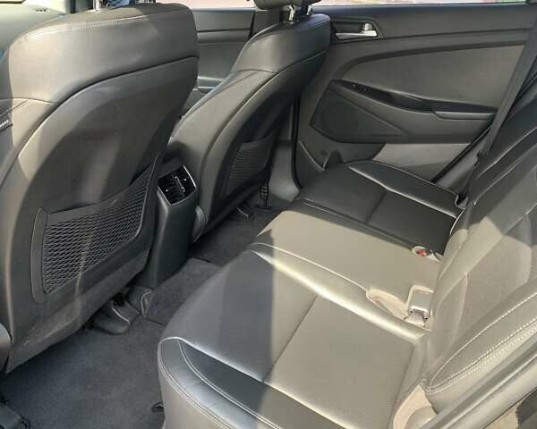 Чорний Хендай Туксон, об'ємом двигуна 1.69 л та пробігом 130 тис. км за 23500 $, фото 4 на Automoto.ua