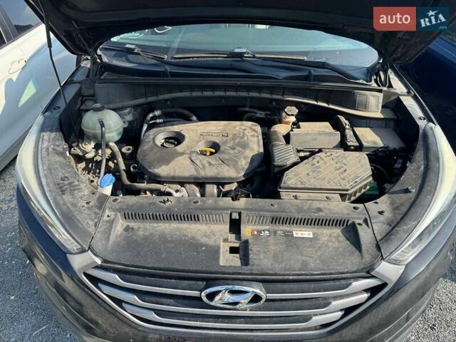 Чорний Хендай Туксон, об'ємом двигуна 2 л та пробігом 119 тис. км за 11700 $, фото 11 на Automoto.ua