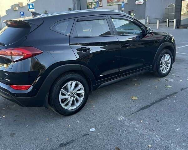 Чорний Хендай Туксон, об'ємом двигуна 1.69 л та пробігом 155 тис. км за 16500 $, фото 1 на Automoto.ua