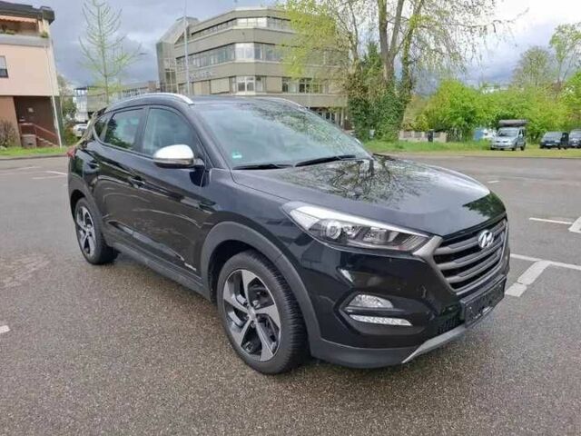 Черный Хендай Туксон, объемом двигателя 2 л и пробегом 87 тыс. км за 7200 $, фото 4 на Automoto.ua