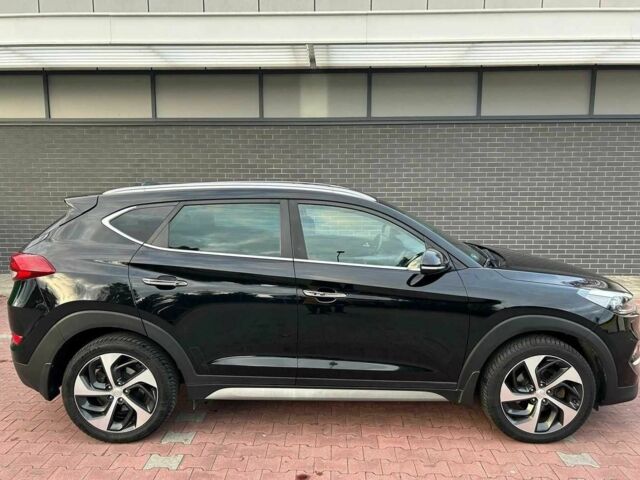 Чорний Хендай Туксон, об'ємом двигуна 1.7 л та пробігом 98 тис. км за 14000 $, фото 7 на Automoto.ua