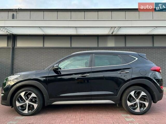 Чорний Хендай Туксон, об'ємом двигуна 1.69 л та пробігом 98 тис. км за 14000 $, фото 11 на Automoto.ua