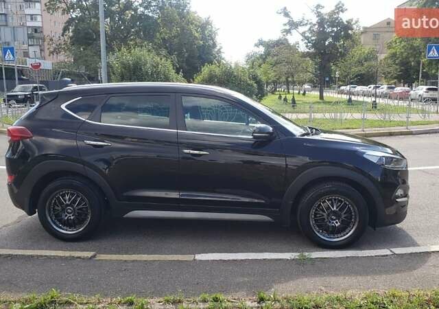 Черный Хендай Туксон, объемом двигателя 1.59 л и пробегом 101 тыс. км за 20600 $, фото 7 на Automoto.ua