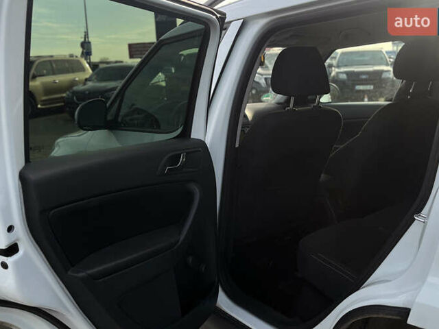 Черный Хендай Туксон, объемом двигателя 2 л и пробегом 242 тыс. км за 12900 $, фото 24 на Automoto.ua