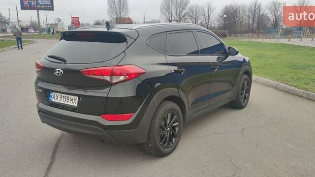 Чорний Хендай Туксон, об'ємом двигуна 2 л та пробігом 143 тис. км за 18000 $, фото 4 на Automoto.ua