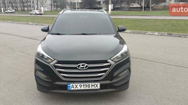 Чорний Хендай Туксон, об'ємом двигуна 2 л та пробігом 143 тис. км за 18000 $, фото 6 на Automoto.ua