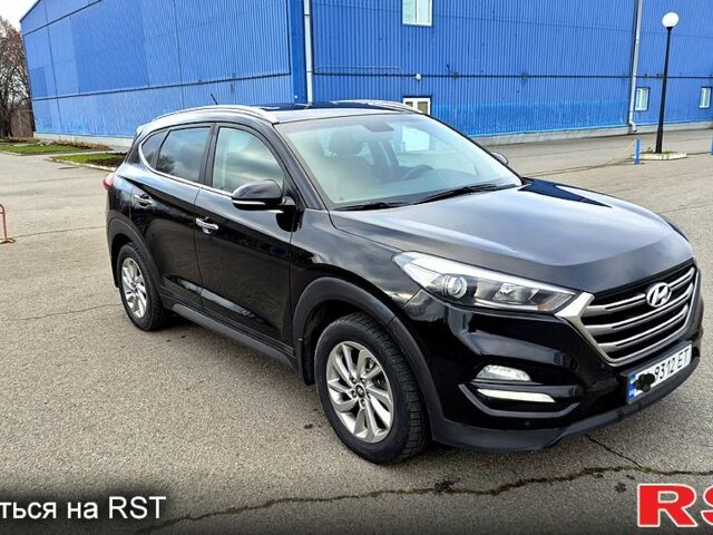 Черный Хендай Туксон, объемом двигателя 2 л и пробегом 123 тыс. км за 15900 $, фото 1 на Automoto.ua