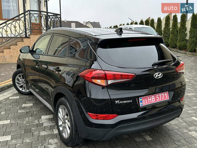 Черный Хендай Туксон, объемом двигателя 2 л и пробегом 156 тыс. км за 12800 $, фото 24 на Automoto.ua