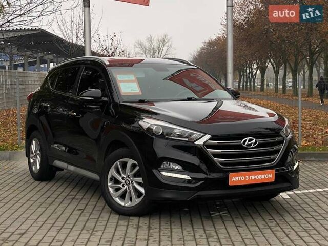 Черный Хендай Туксон, объемом двигателя 2 л и пробегом 106 тыс. км за 19500 $, фото 2 на Automoto.ua