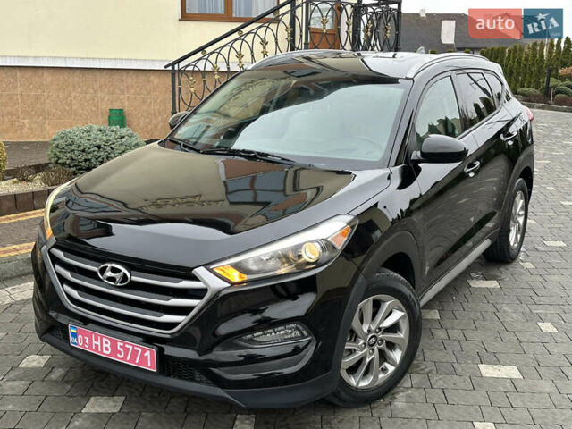 Черный Хендай Туксон, объемом двигателя 2 л и пробегом 156 тыс. км за 12800 $, фото 9 на Automoto.ua