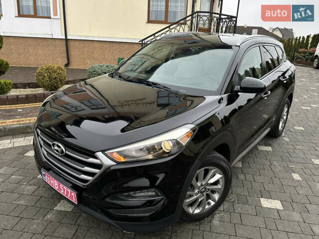 Черный Хендай Туксон, объемом двигателя 2 л и пробегом 156 тыс. км за 12800 $, фото 15 на Automoto.ua