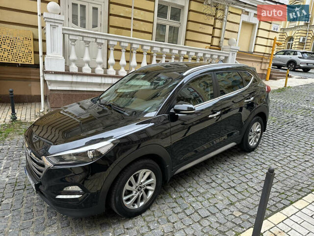 Черный Хендай Туксон, объемом двигателя 2 л и пробегом 100 тыс. км за 16900 $, фото 17 на Automoto.ua